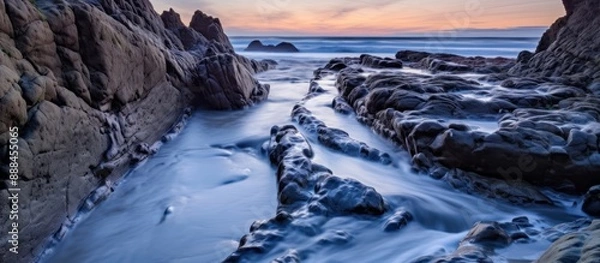 Obraz Serene Sunset Over Rocky Coastline