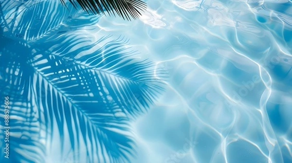 Obraz Palm leaf shadow on blue water waves