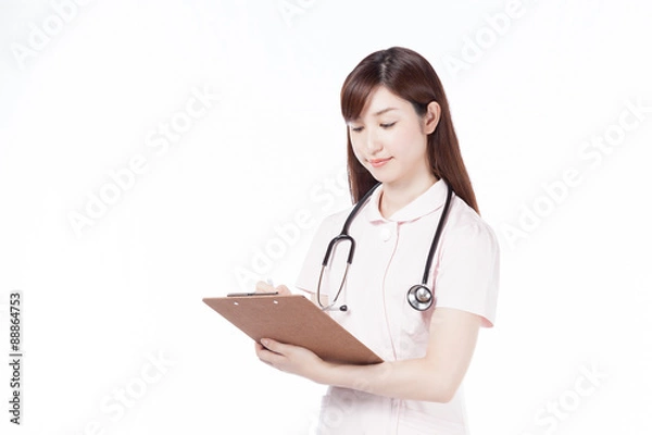 Fototapeta 看護師　笑顔　カルテ　ボード　記入　聴診器
