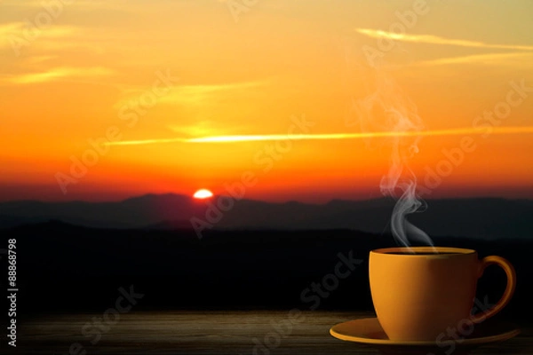 Obraz cup from coffee on a sunset