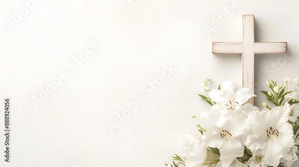 Fototapeta Composition with a Christian wooden cross and flowers against muted white background with space for text. Funeral invitation template