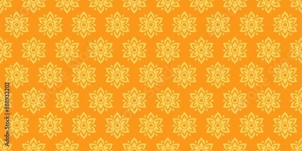 Fototapeta A pattern of yellow flowers is spread across a bright orange background