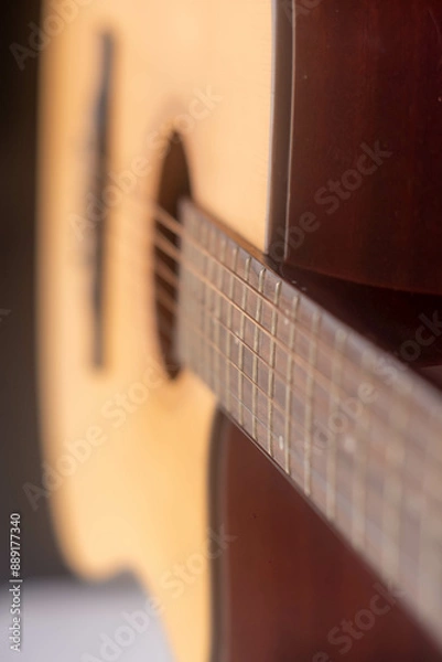 Fototapeta guitar from light wood on a whith background. 