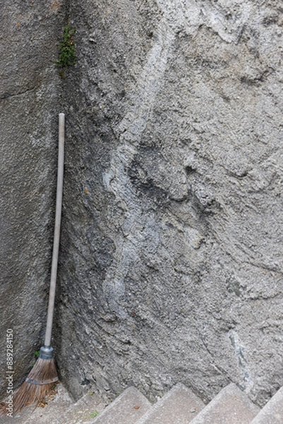 Obraz a old broom in a corner