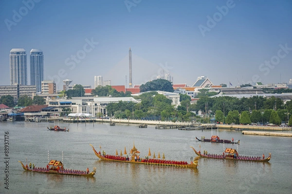 Fototapeta Landscape of Thai's king palace with goldent guard ship on the front.