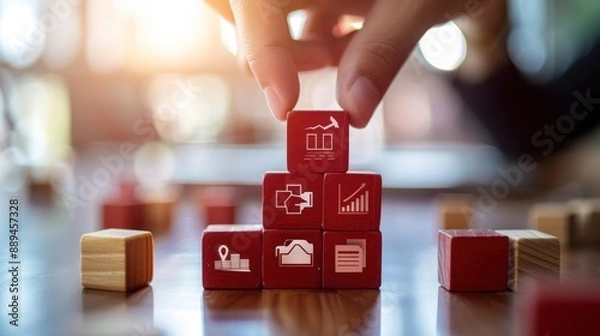 Fototapeta hands holding red cubes