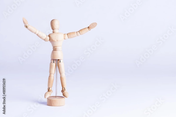 Fototapeta wooden mannekin on white background