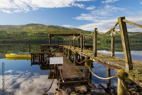 Obraz A view of a jetty on the Scottish Loch Tay, on a sunny summers morning

