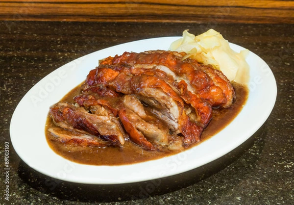 Fototapeta Delicious Roast Duck on stone background