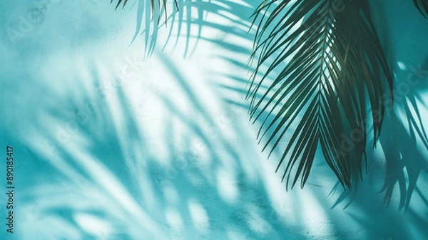 Obraz Palm leaves on pastel teal background
