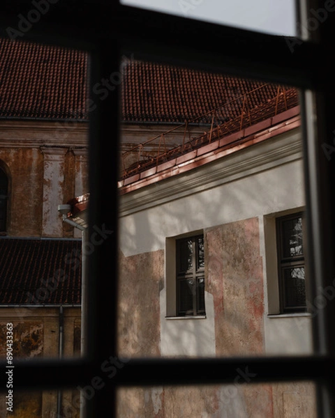 Fototapeta Old Building Seen Through Window Frame