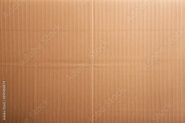 Obraz Close-up view of a textured brown cardboard surface, perfect for background or packaging themed projects. Neutral and ecologically friendly material.