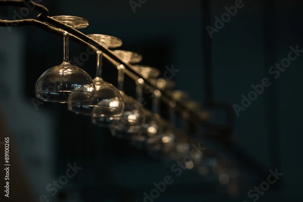 Obraz Brandy glasses hang up side down.