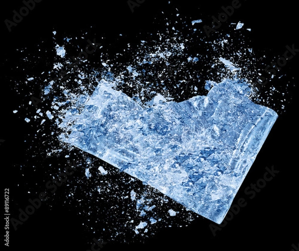 Fototapeta Abstract blue Ice crash explosion parts on black background. Collision, suspension crystal ice cubes damage.