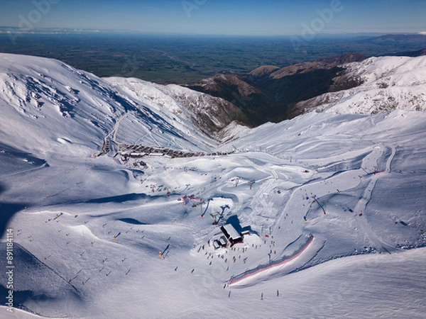 Fototapeta Mt Hutt, New Zealand: Aerial view of Mt Hutt ski resort slopes and chair lift in the Canterbury region on a winter sunny day in New Zealand south island near Chistrchurch