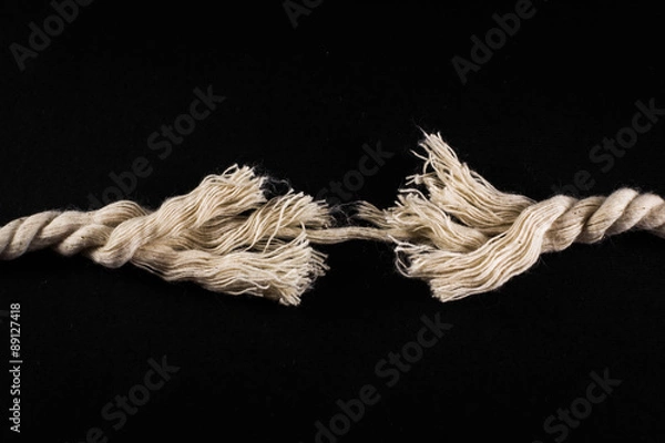 Obraz Frayed Rope and Thread on Black Background