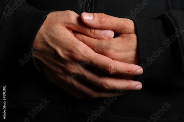 Fototapeta Folded hands of a priest