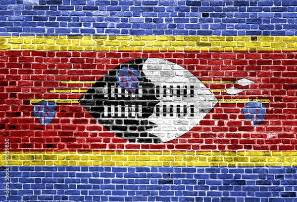 Fototapeta Flag of Swaziland painted on brick wall, background texture