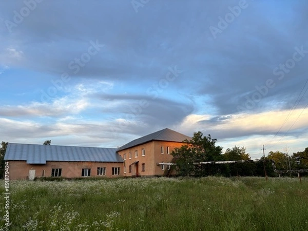Fototapeta abandoned house in the sunset