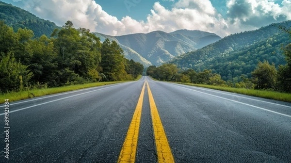 Fototapeta View of an expansive road heading towards the Great Smoky Mountains National Park, Tennessee, with scenic mountain and forest views