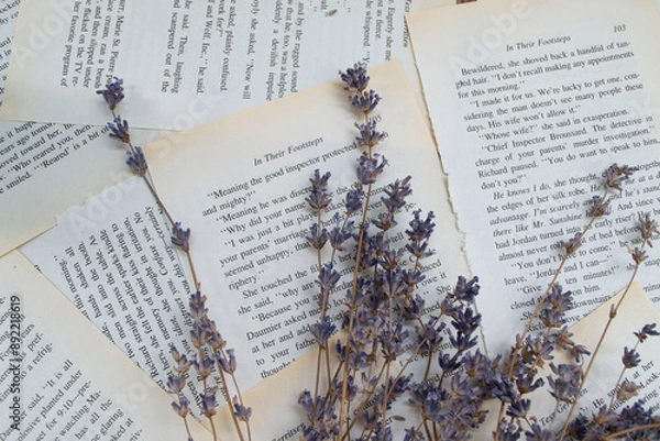 Obraz Lavender flowers, lavender on a background of book sheets background, with lavender flowers