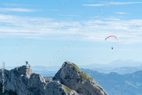 Obraz paraglider above the sumit