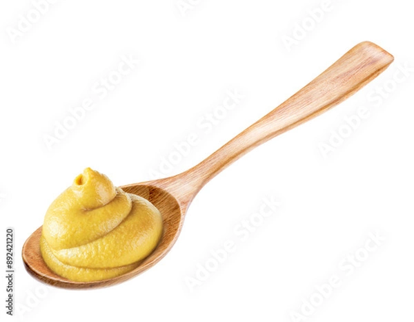 Fototapeta Squeezed mustard on a spoon isolated white background.