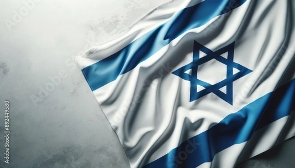 Fototapeta The flag of Israel on a grey textured background.