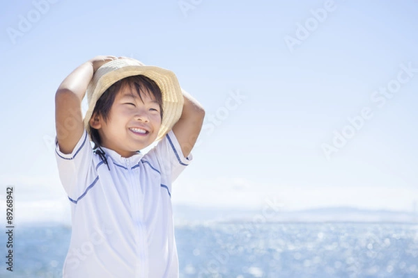 Obraz 海で遊ぶ子供