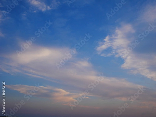 Obraz Beautiful white clouds in the blue sky at sunset