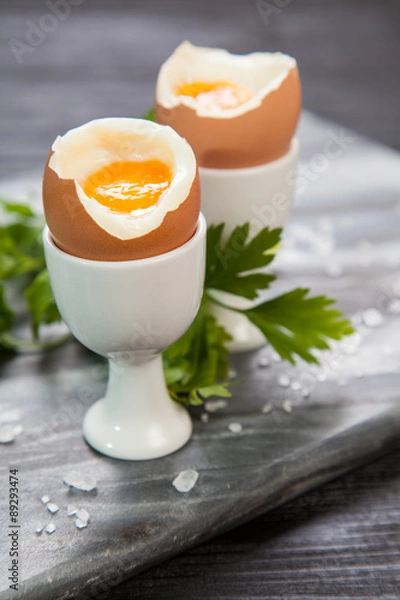 Fototapeta Boiled eggs on marble background