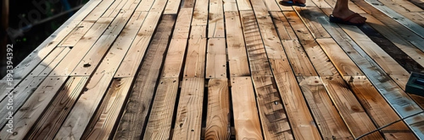 Obraz Constructing the wooden flooring of a patio