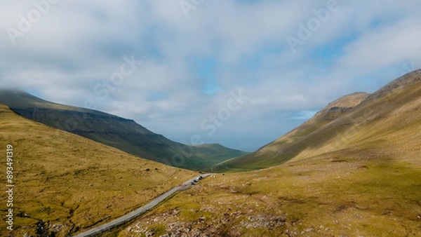 Fototapeta Funningur village, Faroe Islands. Sunny day in summer. Amazing nature in Faroe Islands. Eysturoy Island. Gonguturur or Hvithamar Trailhead. Faroese fjord and summits