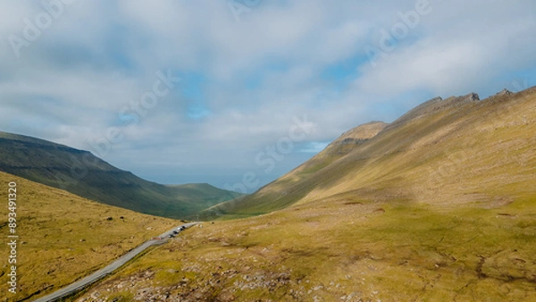 Fototapeta Funningur village, Faroe Islands. Sunny day in summer. Amazing nature in Faroe Islands. Eysturoy Island. Gonguturur or Hvithamar Trailhead. Faroese fjord and summits