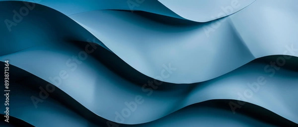 Fototapeta Artistic close-up of blue abstract waves, the smooth curves and shadows creating a visually soothing and flowing image.