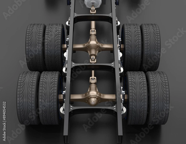 Fototapeta Rear view of Semi truck ladder frame, drive shaft and axle system on black background. Generic design. 3D rendering image.