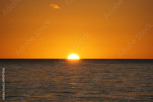 Obraz 海から上がる日の出