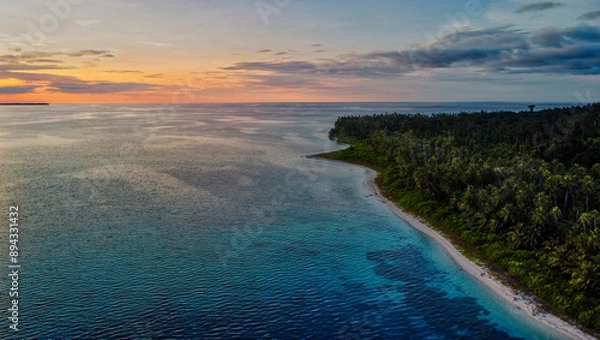 Obraz An aerial view of Sumatra's coastline during Sunset, showcasing the stunning contrast between lush tropical forests and vibrant turquoise waters. A paradise waiting to be explored.