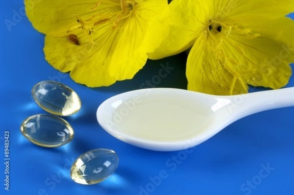 Fototapeta Evening primrose (Oenothera biennis) and evening primrose oil