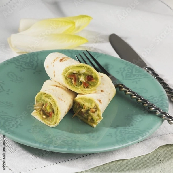 Fototapeta Wraps filled with avocado and chicory