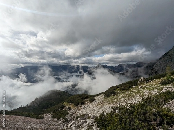 Obraz Wide panoramic view of Grosser Priel mountain peak in the Austrian Alps surrounded by rocky ridges and alpine nature.

