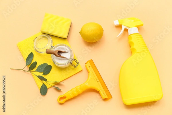 Fototapeta Composition with natural products for cleaning, duster and sponge on color background
