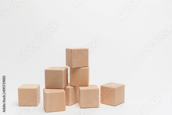 Obraz Wooden Blocks Arranged In Ascending Order On White Background