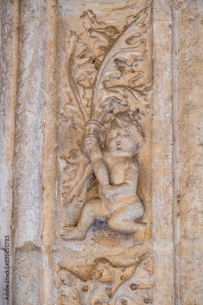 Fototapeta Naked cherub, cloister of the Monastery of San Juan de los Reyes, Toledo, Castilla-La Mancha, Spain