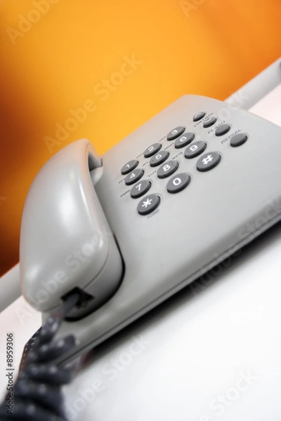 Obraz a simple grey office phone