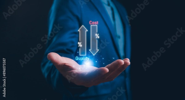 Fototapeta Quality control concept: A businessman holds symbols showing an upward arrow Quality and a downward arrow Cost management aimed at controlling expenses while product and service quality.