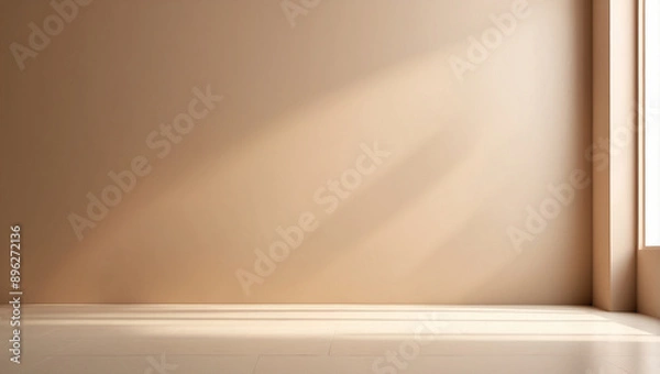 Fototapeta Minimalistic abstract gentle light brown background for product presentation with empty room with shadows of window