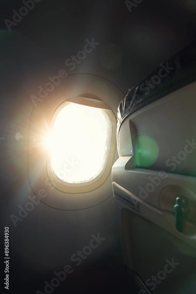Fototapeta Airplane window. View from inside the cabin.