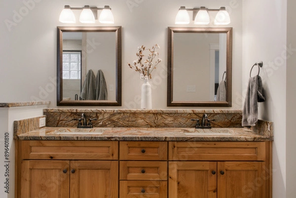 Fototapeta Double Sink Vanity With Granite Countertops And Wooden Cabinets In Bathroom