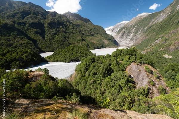 Fototapeta Elevated view from Sentinel Rock looking up the Waiho River valley to the Franz Josef glacier in the Southern Alps, West Coast, South Island, New Zealand.